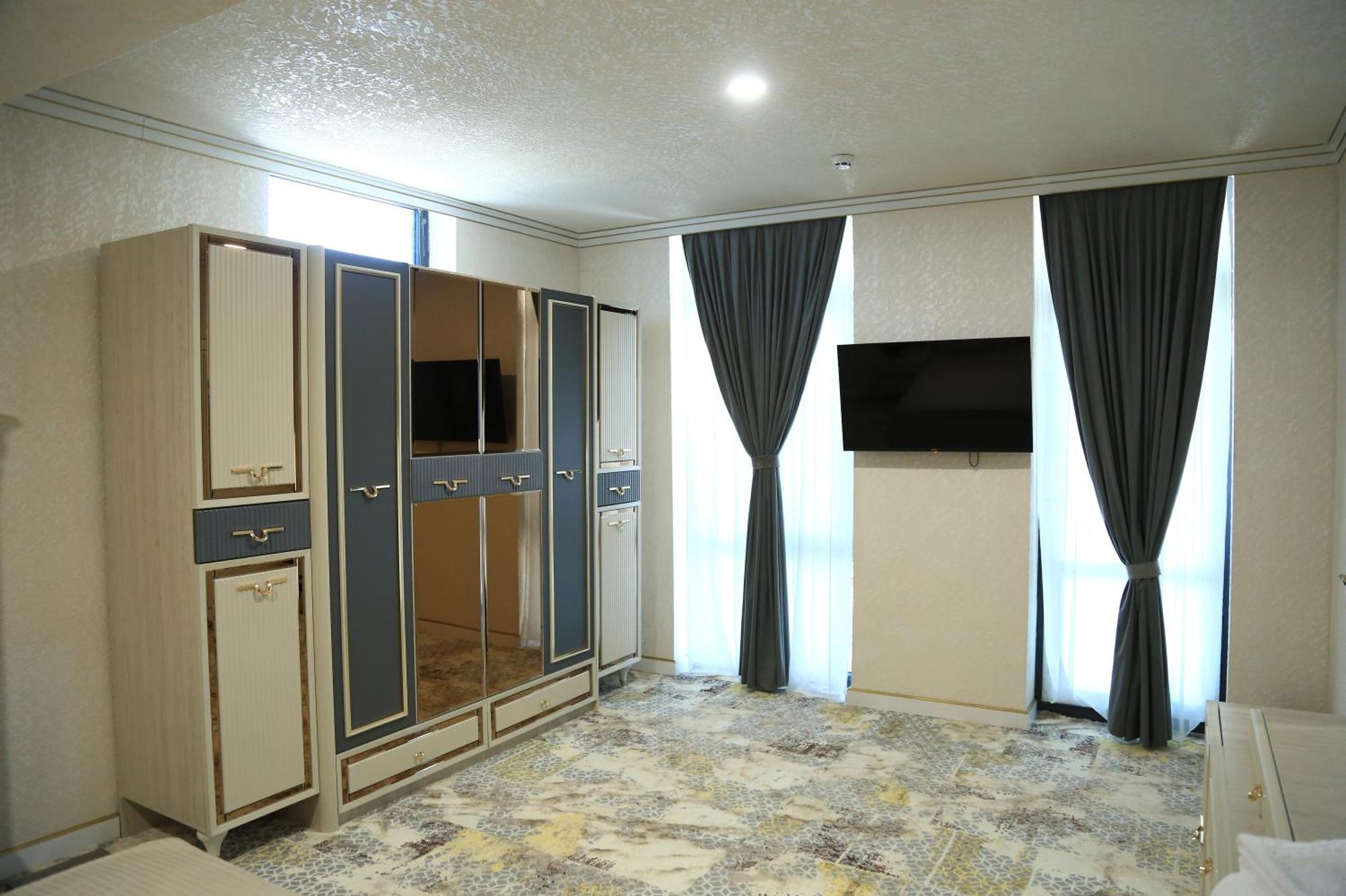 Bukhara City Hotel Turon City Plaza Extérieur photo