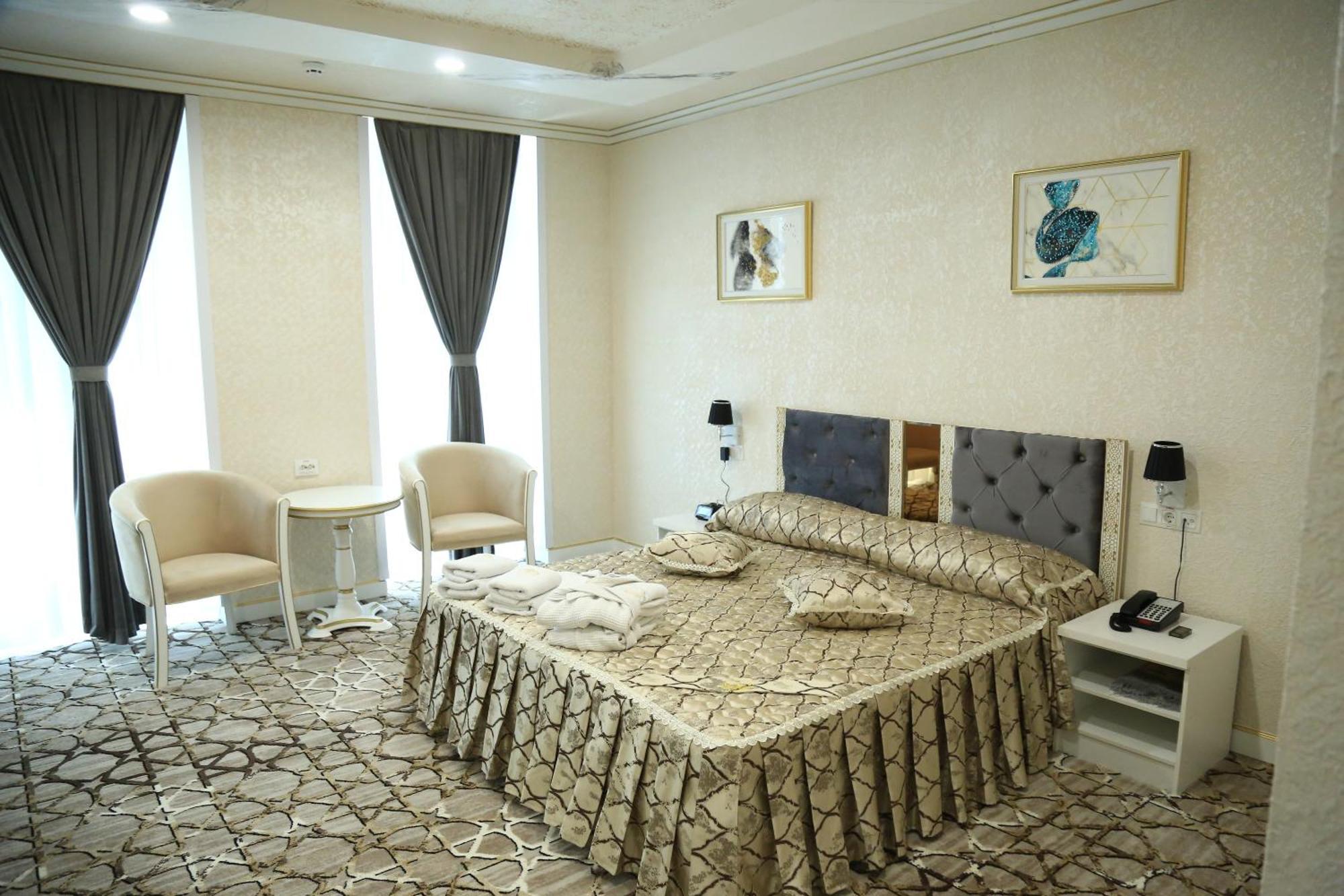 Bukhara City Hotel Turon City Plaza Extérieur photo